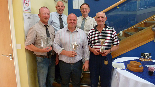 The Charolais trophy winners: Back row BCCS President Ralph Needham, Welsh Charolais Chairman, Griff Morris Front row, Peter Howells, Charlie Boden and Mike Brown 