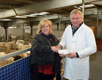 Wil Owen presented a cheque for £361 raised in a raffle at the Welsh Winter Fair to Llyn Hughes of the Welsh Air Ambulance