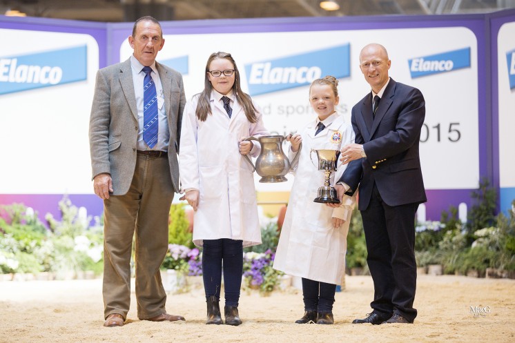 Ronan Murphy CEO of Weatherbys and the judge Danny Wyllie presented Ellie Knox and Hannah Knox with the Fairway Trophy for the junior section